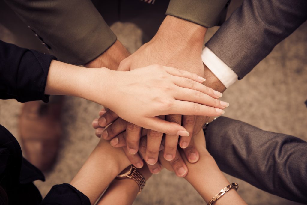 Team Members Holding Hands
